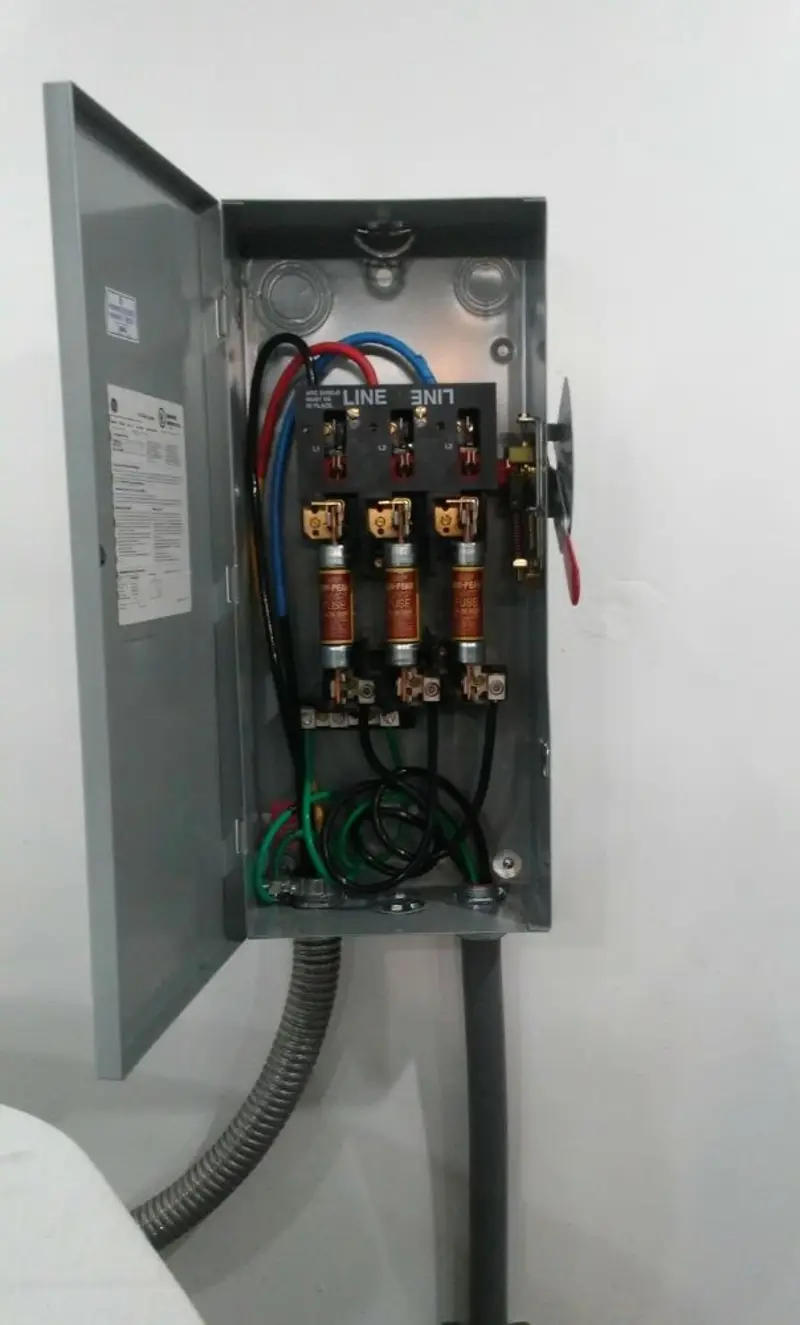 Three-phase disconnect switch installed for Smoke Detector Installation in Adrian