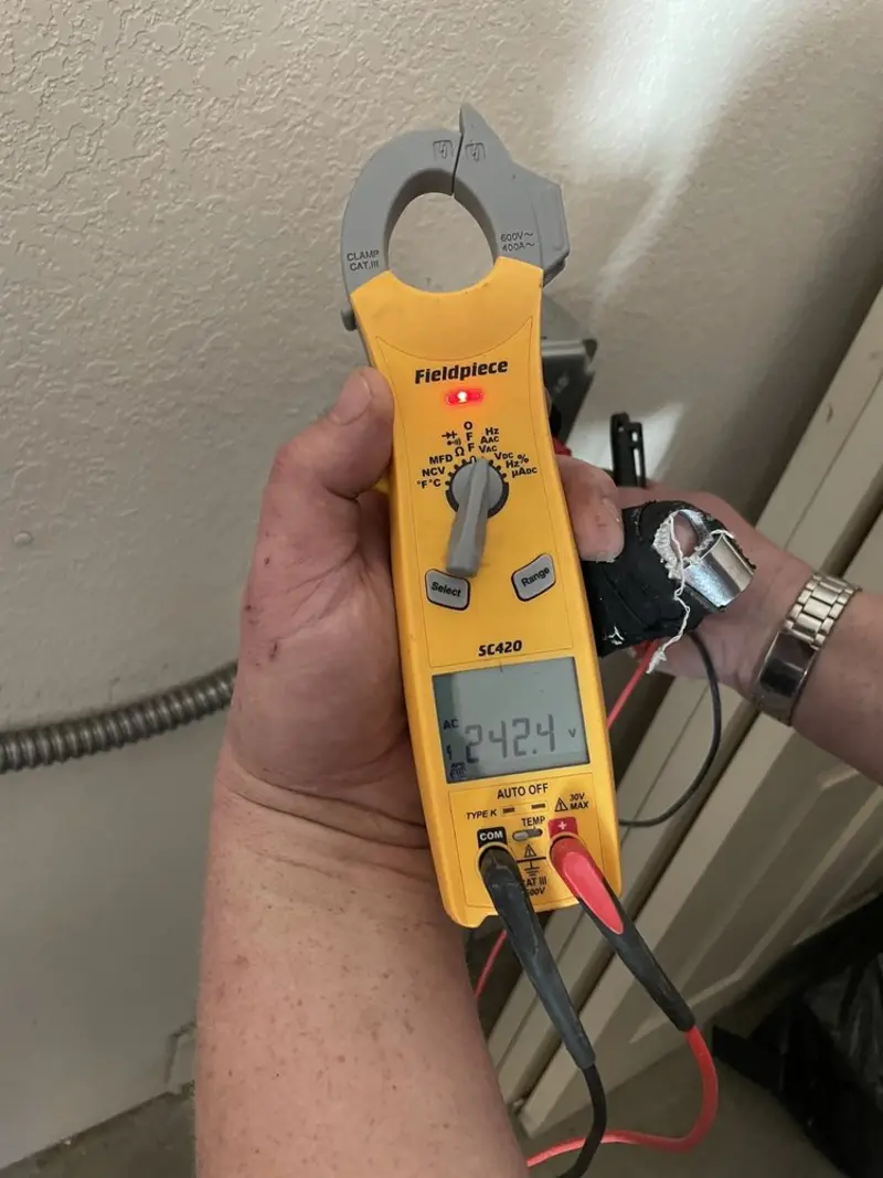 Voltage testing with clamp meter during Aluminum Wiring Replacement in Adrian